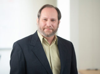 Rick Chapman, PhD, MS. Director of Health Economics
