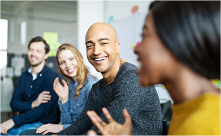 cheerful creative patients sitting in a circle laughing